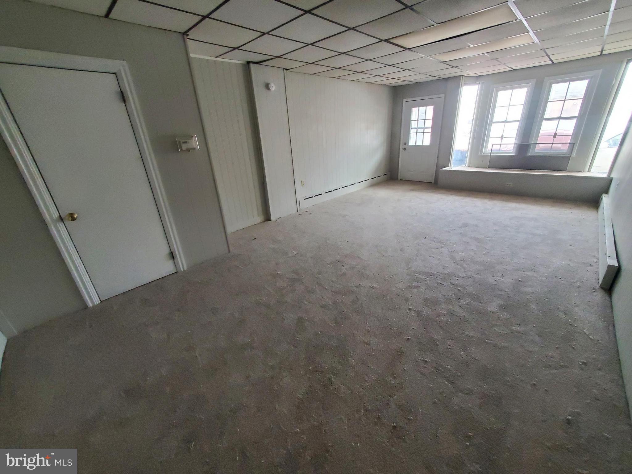 127 North 9th Street, Unit 1 Lebanon, PA 17046 - Photo 2 of 11 a view of empty room with windows