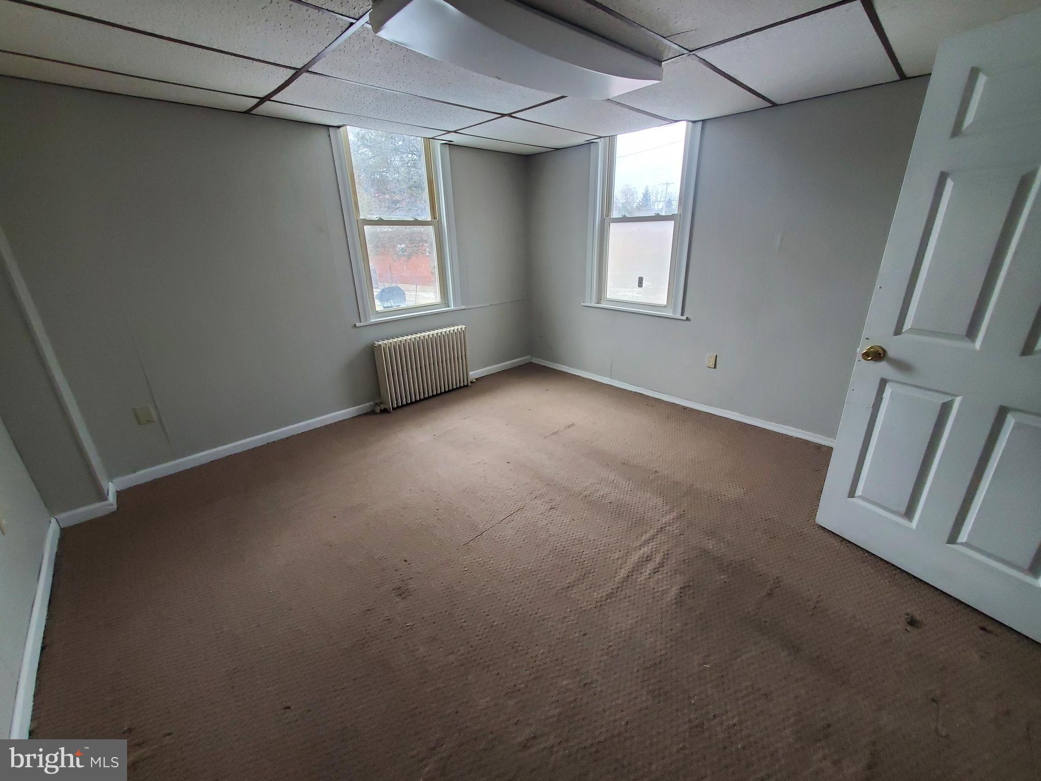 127 North 9th Street, Unit 1 Lebanon, PA 17046 - Photo 8 of 11 a view of empty room with windows