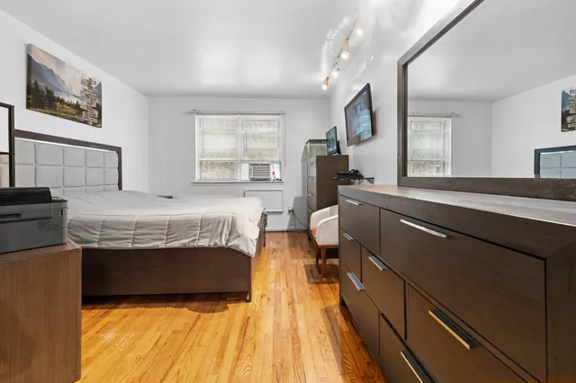 a kitchen with stainless steel appliances a refrigerator sink and cabinets
