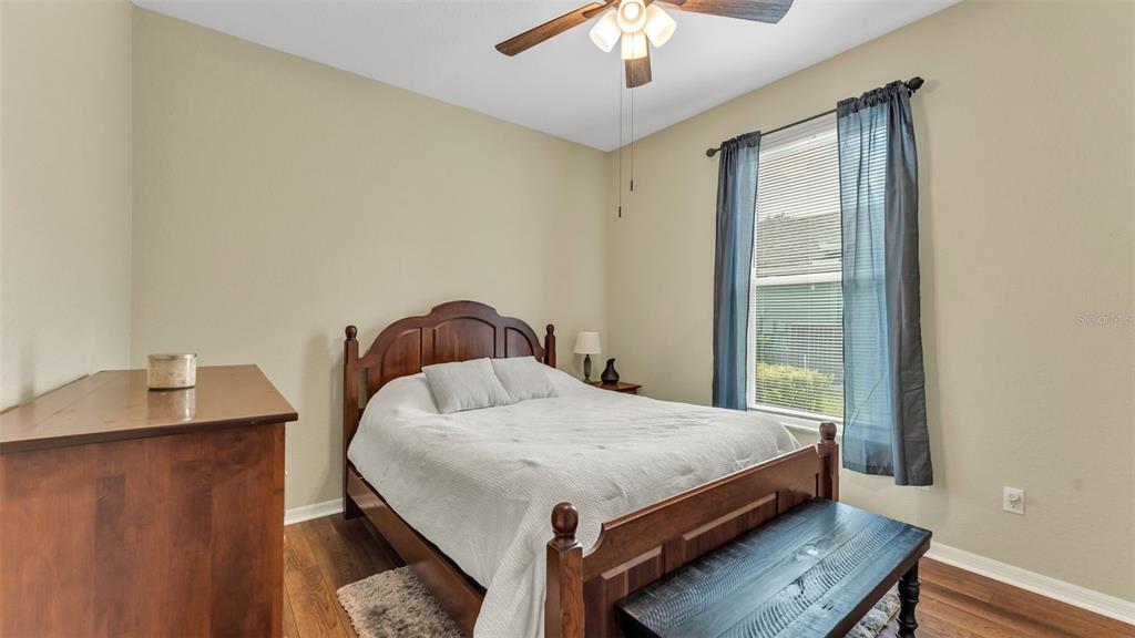 2803 Spring Meadow Drive Plant City, FL 33566 - Photo 40 of 74 a bed sitting in a bedroom next to a window