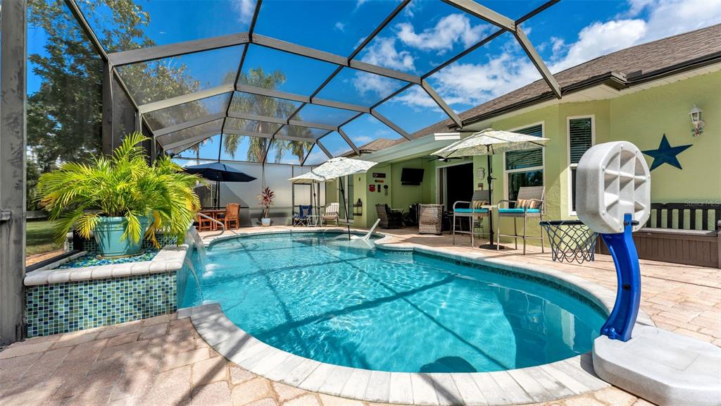 2803 Spring Meadow Drive Plant City, FL 33566 - Photo 50 of 74 a view of a swimming pool with a patio