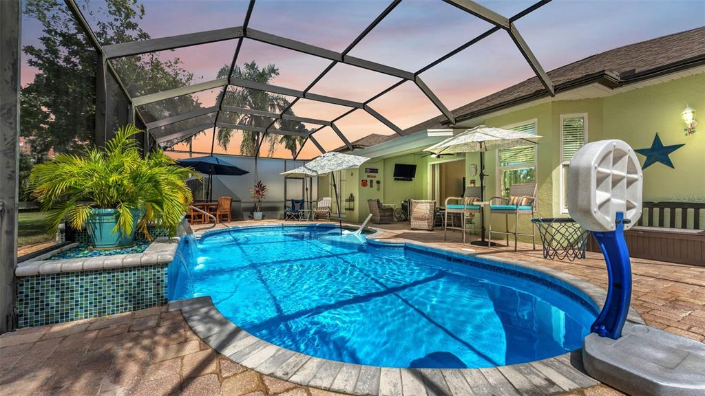 2803 Spring Meadow Drive Plant City, FL 33566 - Photo 51 of 74 a view of a house with a patio