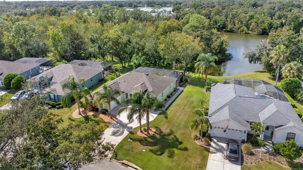 2803 Spring Meadow Drive Plant City, FL 33566 - Photo 72 of 74 an aerial view of house with yard swimming pool and outdoor seating