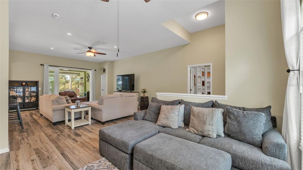 2803 Spring Meadow Drive Plant City, FL 33566 - Photo 9 of 74 a living room with furniture and a large window
