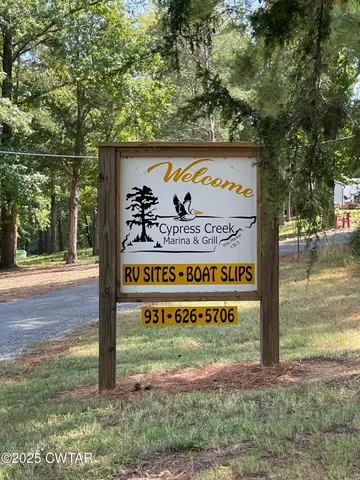 a sign on the side of the road