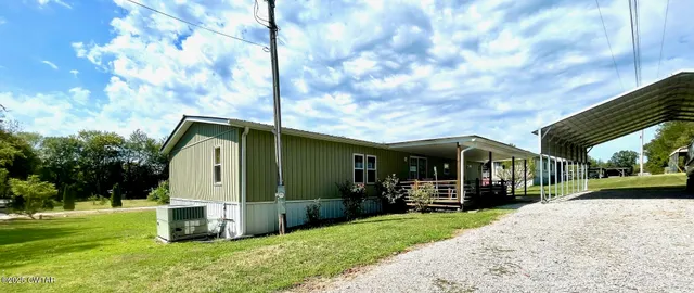a front view of house with yard