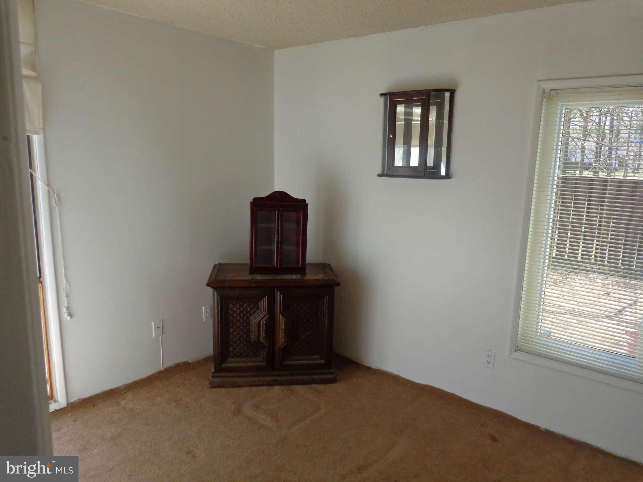 2249 Southgate Square Reston, VA 20191 - Photo 5 of 6 an empty room with windows