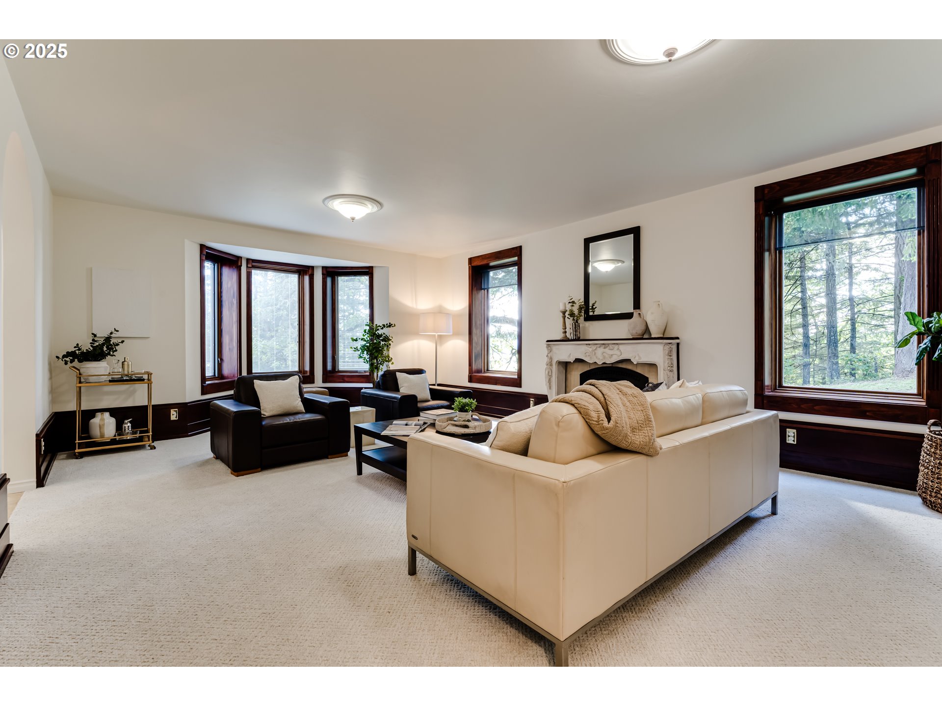 27161 Briggs Hill Road Eugene, OR 97405 - Photo 11 of 47 a living room with furniture and a large window