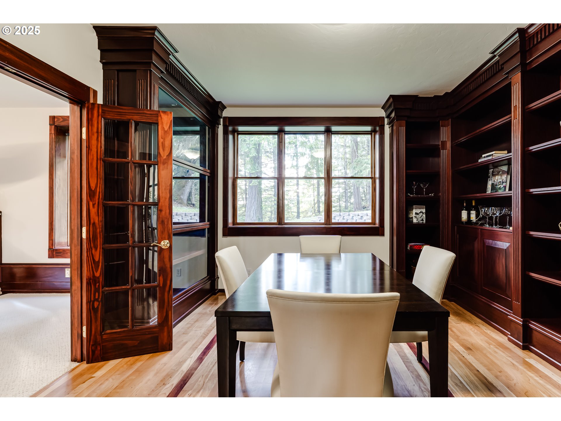 27161 Briggs Hill Road Eugene, OR 97405 - Photo 13 of 47 a view of a dining room with furniture and wooden floor