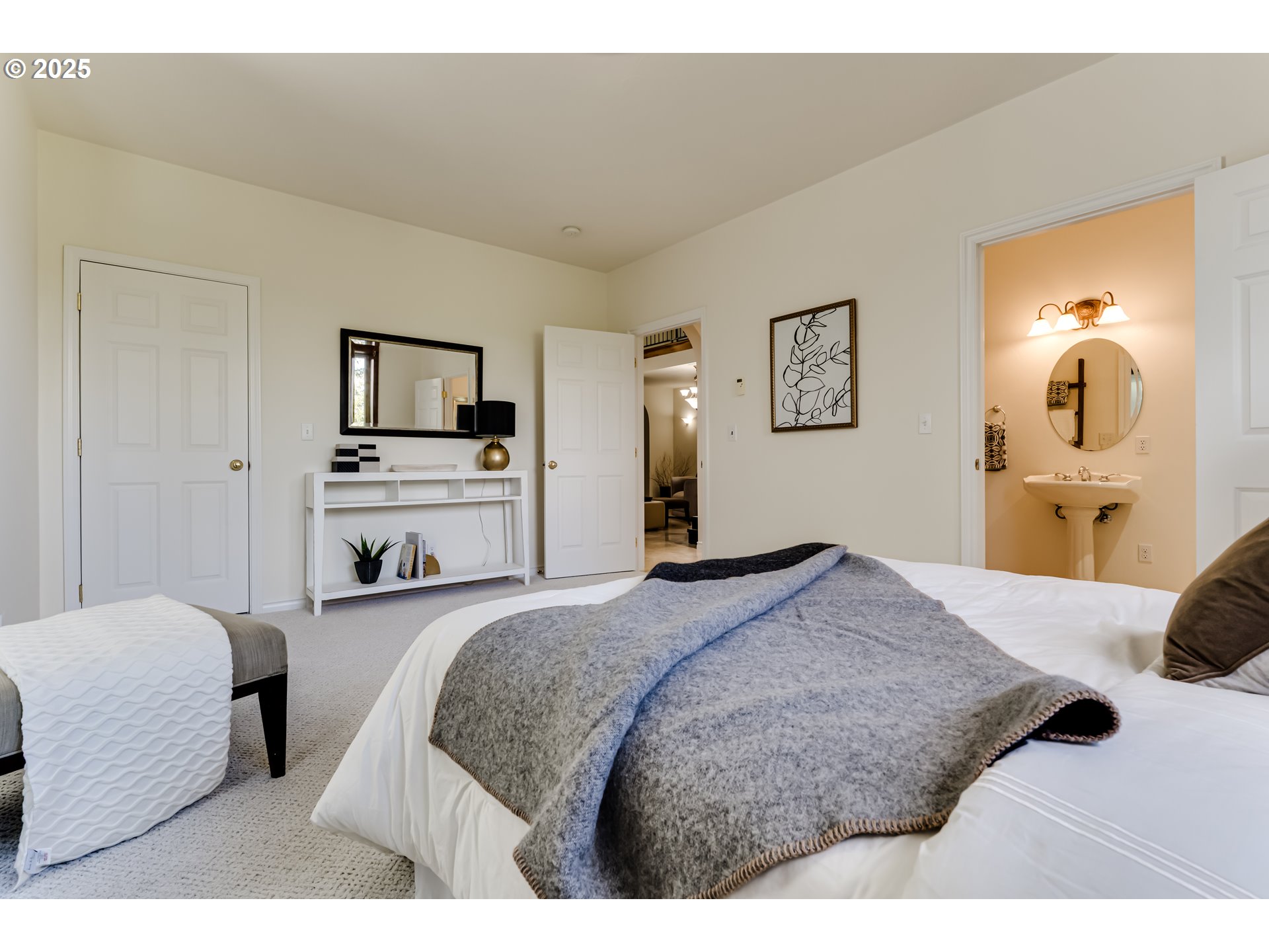 27161 Briggs Hill Road Eugene, OR 97405 - Photo 20 of 47 a bedroom with a bed and a flat screen tv