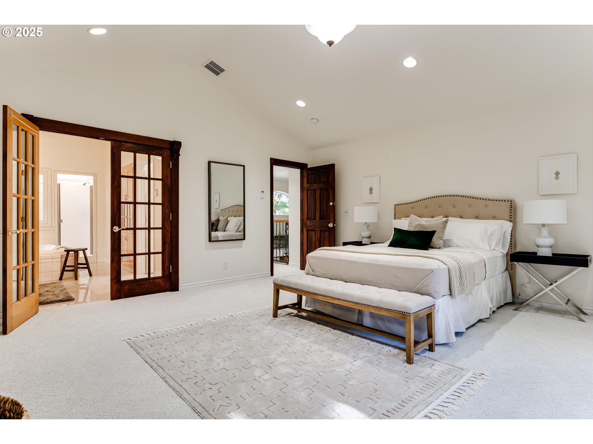 27161 Briggs Hill Road Eugene, OR 97405 - Photo 26 of 47 a bedroom with a bed and a lamp