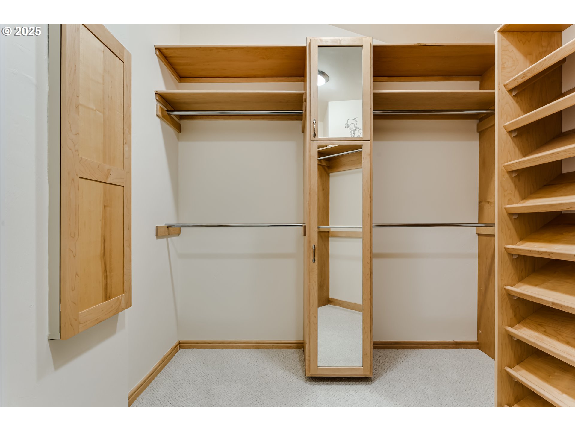 27161 Briggs Hill Road Eugene, OR 97405 - Photo 28 of 47 a view of walk in closet with empty racks