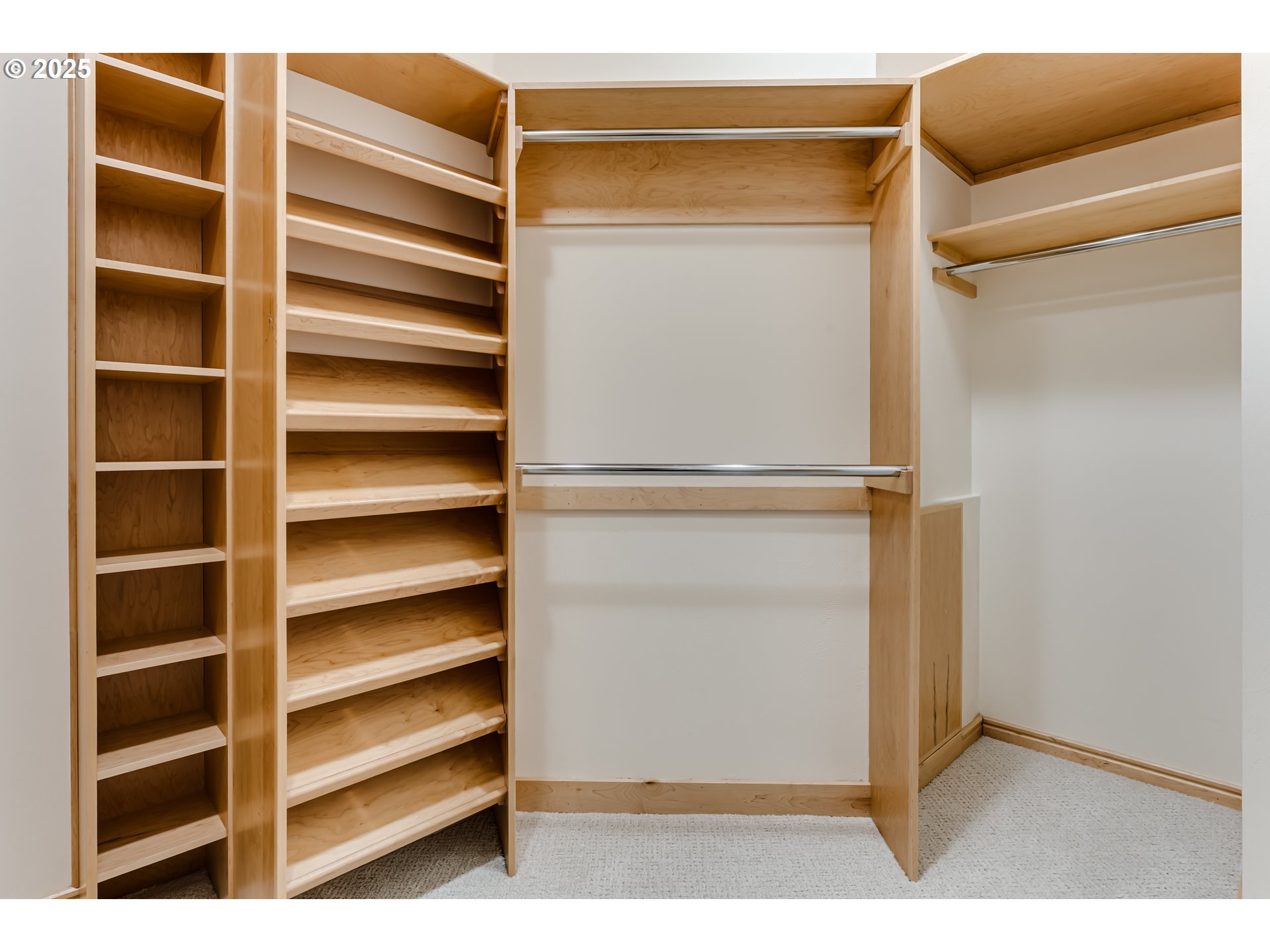 27161 Briggs Hill Road Eugene, OR 97405 - Photo 29 of 47 a view of walk in closet with empty racks