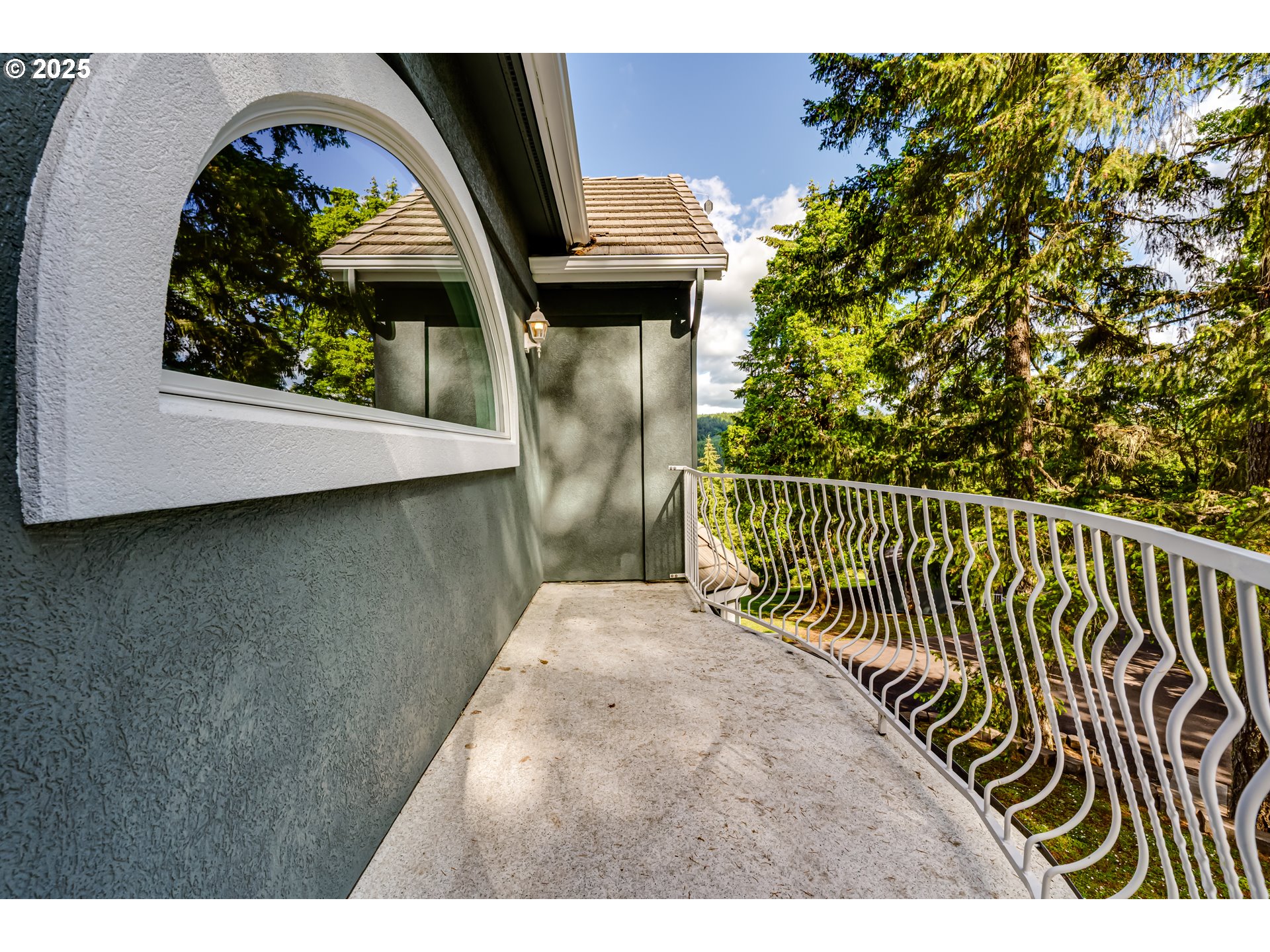 27161 Briggs Hill Road Eugene, OR 97405 - Photo 30 of 47 a view of balcony with wooden floor