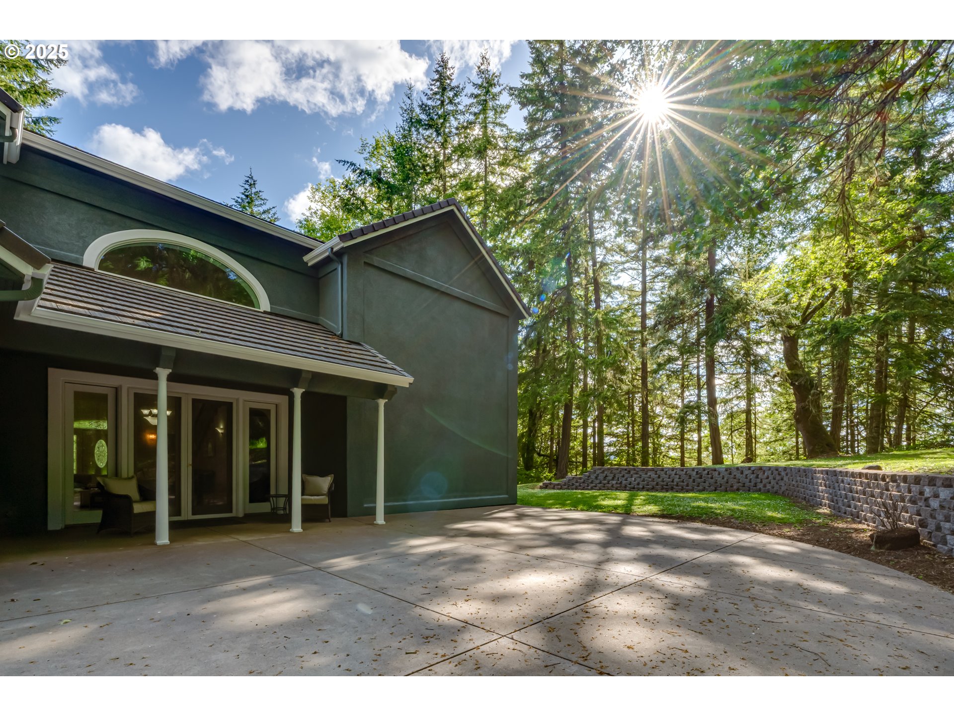 27161 Briggs Hill Road Eugene, OR 97405 - Photo 40 of 47 a front view of a house with a garden