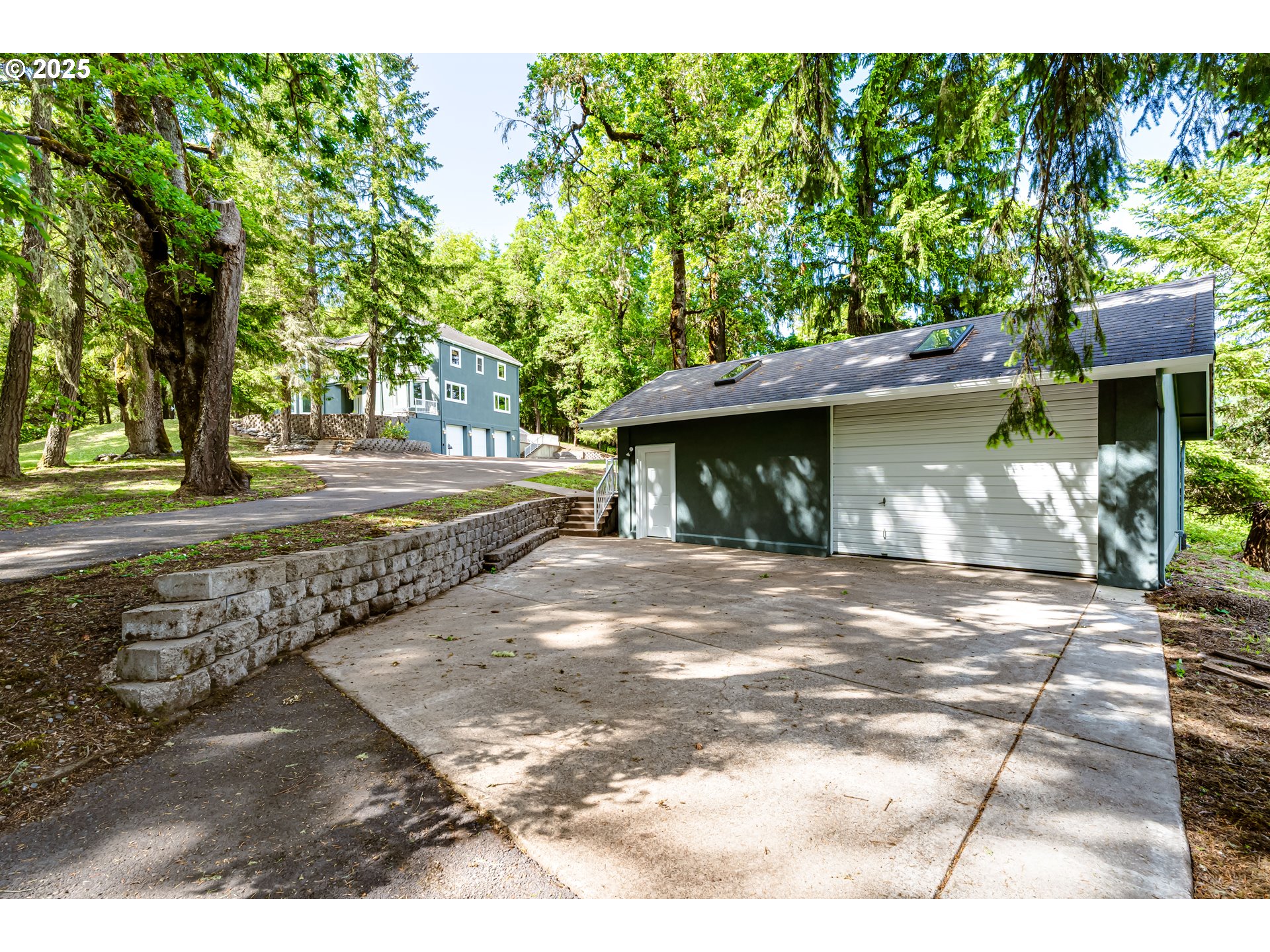 27161 Briggs Hill Road Eugene, OR 97405 - Photo 43 of 47 a front view of a house with a yard