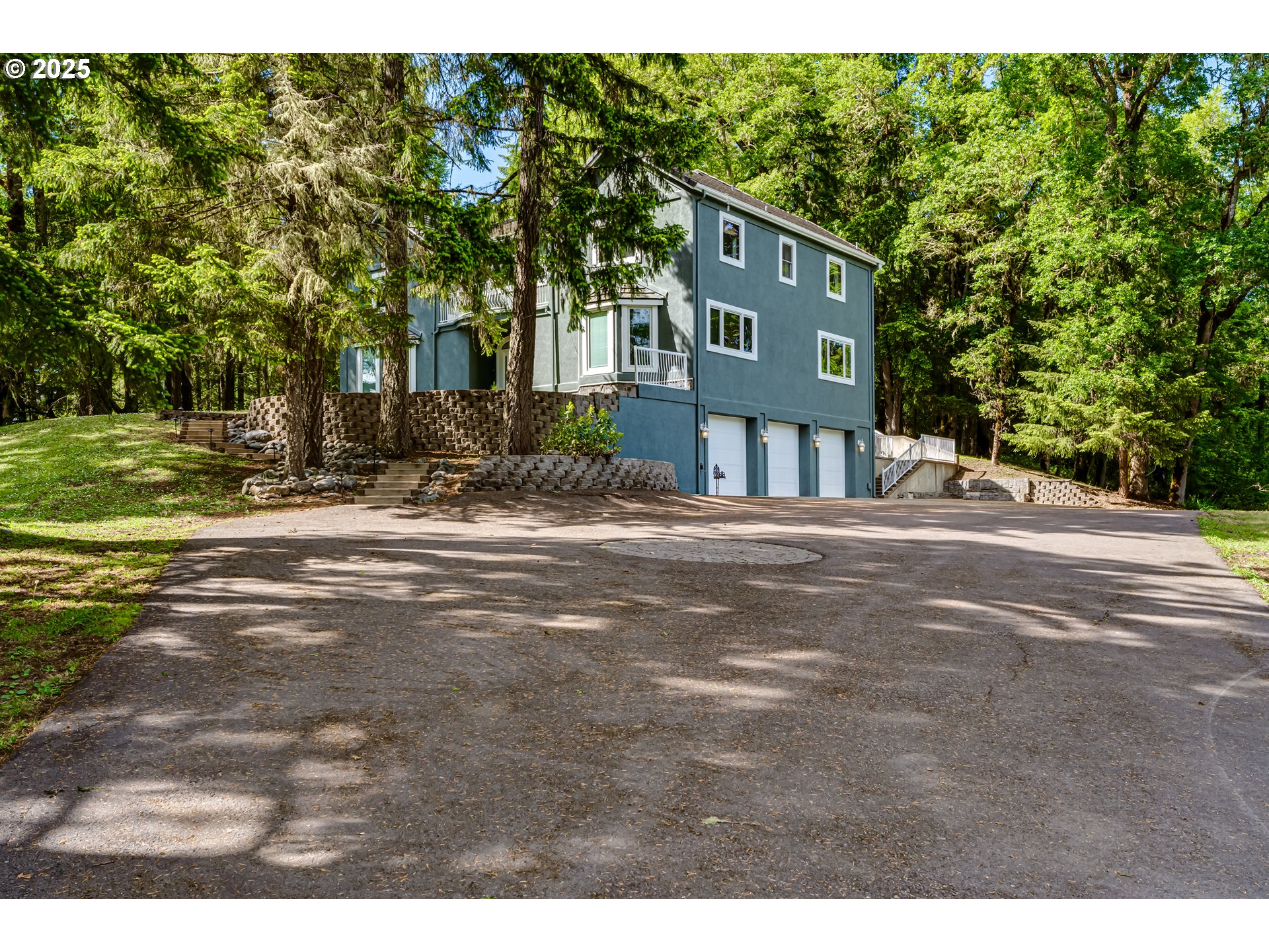 27161 Briggs Hill Road Eugene, OR 97405 - Photo 6 of 47 a front view of a house with a yard