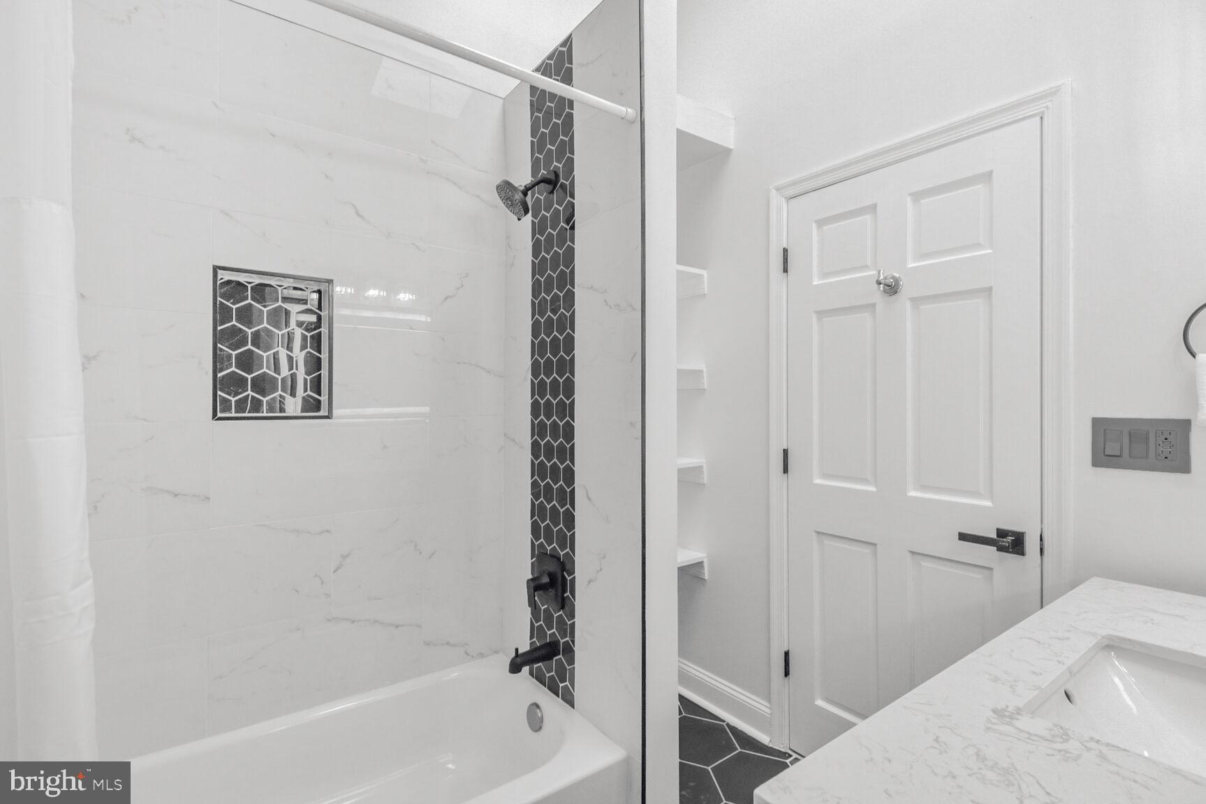 226 South Madeira Street Baltimore, MD 21231 - Photo 14 of 21 a bathroom with a bathtub and shower