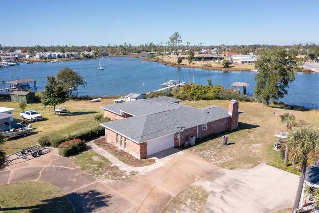 an aerial view of a house with a outdoor space
