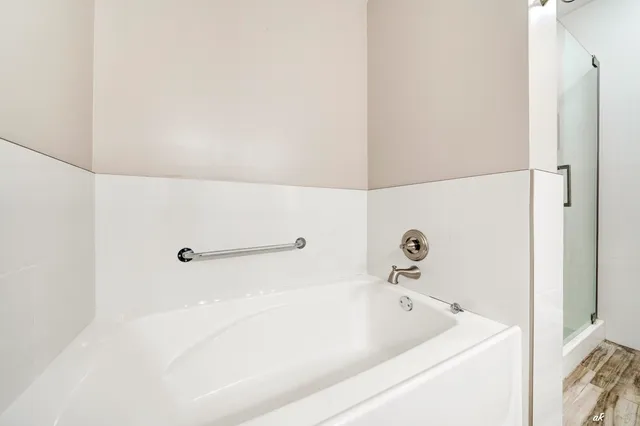 a view of entryway with wooden floor