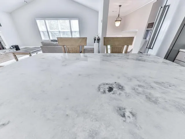 a view of a livingroom with a furniture and window
