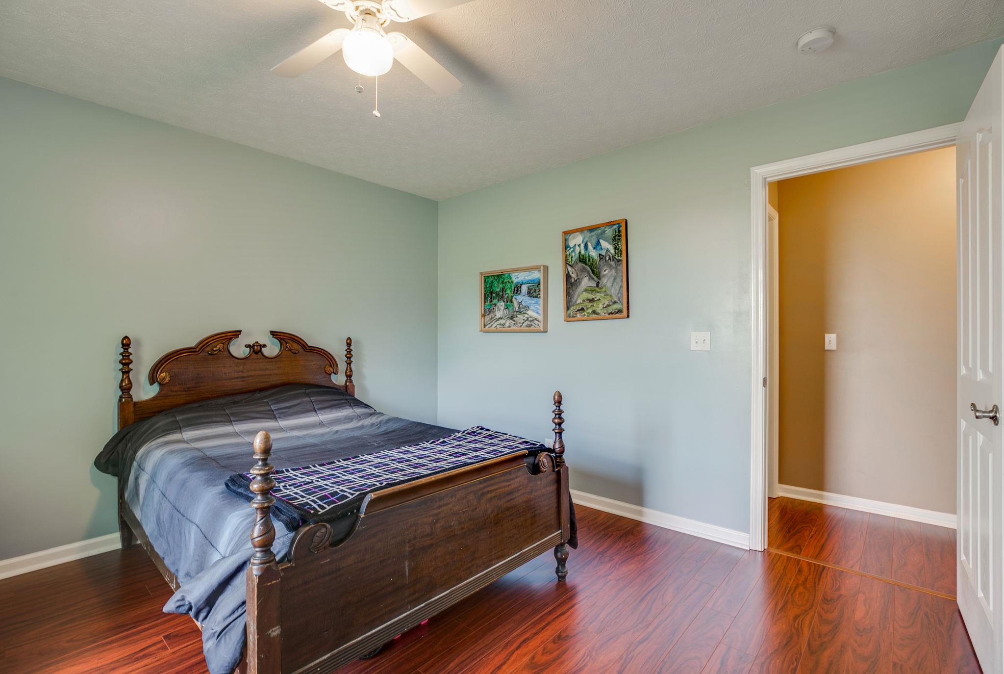 229 Rich Road Unionville, TN 37180 - Photo 27 of 30 a bed sitting in a bedroom next to a window