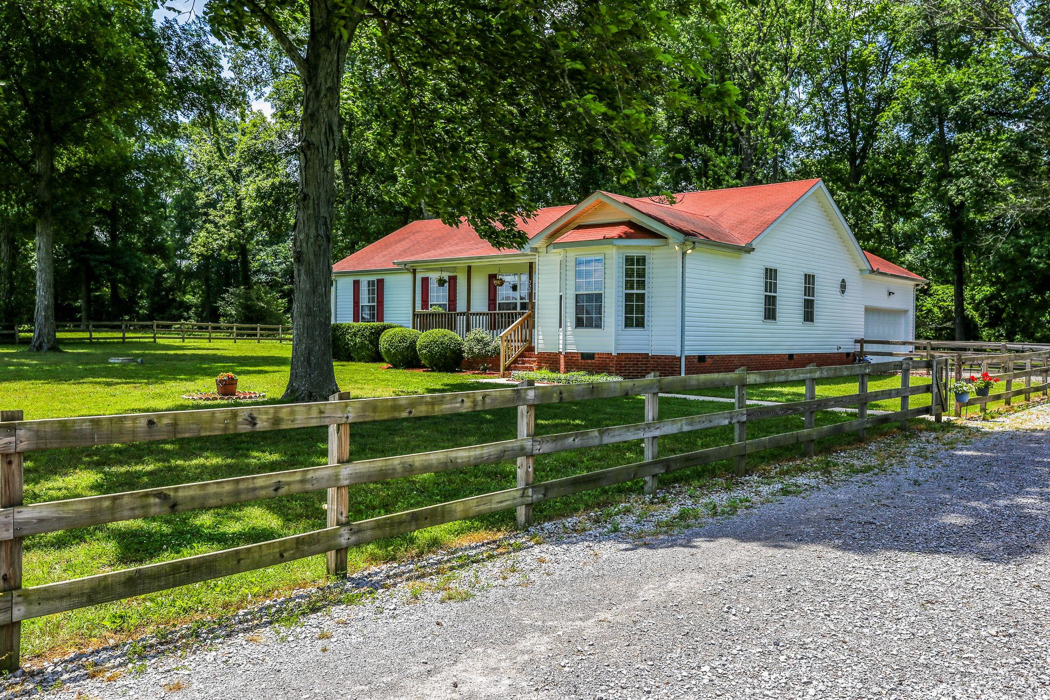 229 Rich Road Unionville, TN 37180 - Photo 3 of 30 a front view of a house with a yard