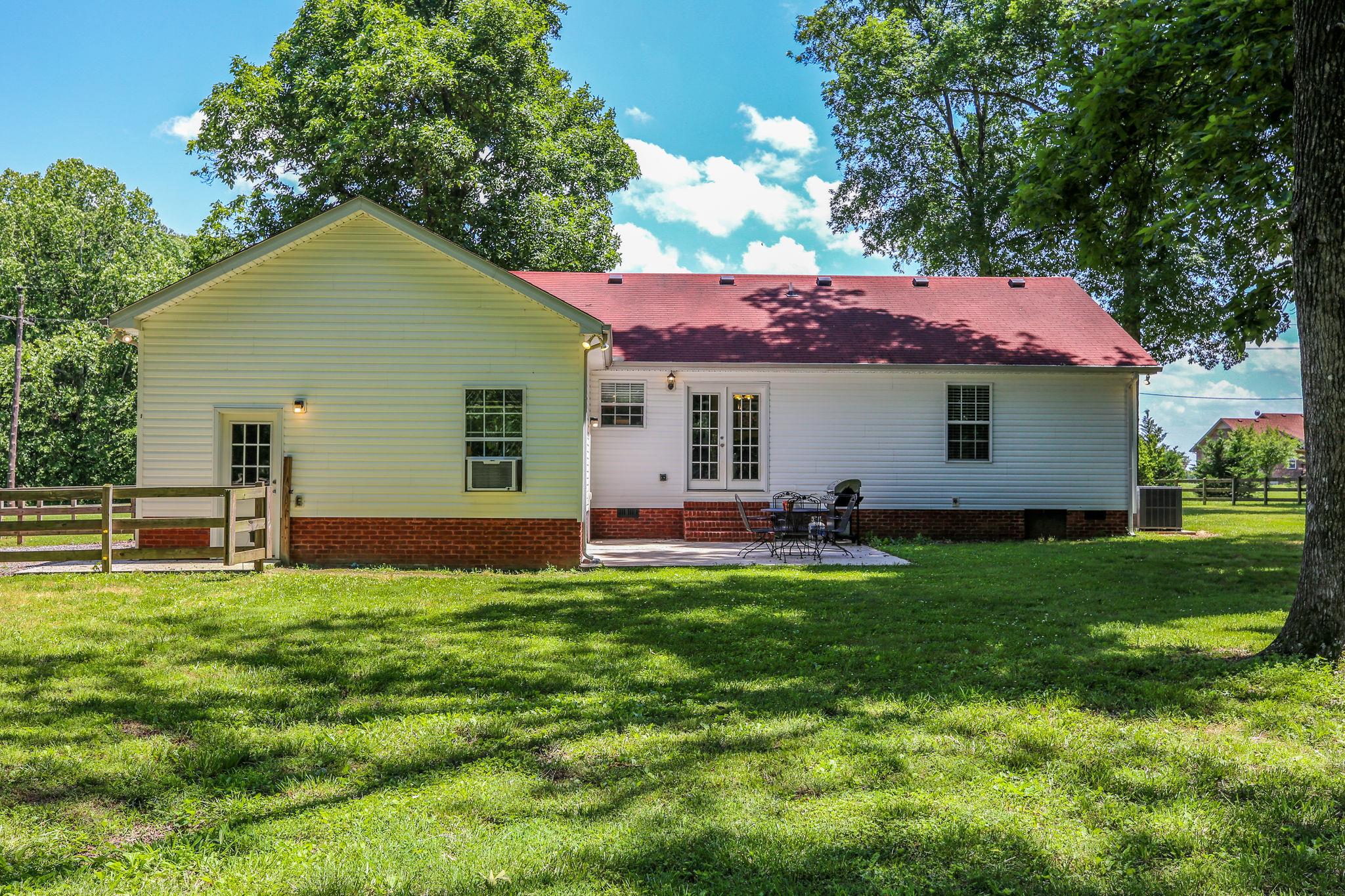 229 Rich Road Unionville, TN 37180 - Photo 8 of 30 a view of a house with a yard and sitting area
