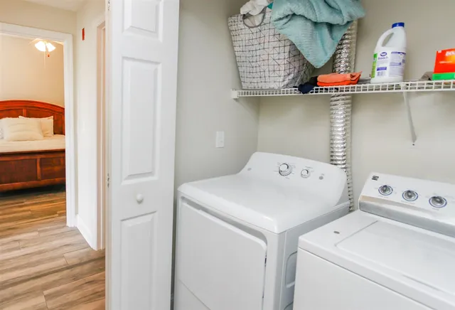a utility room with dryer and washer