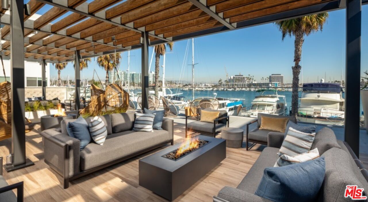 13900 Panay Way, Unit M312 Marina del Rey, CA 90292 - Photo 21 of 21 a view of a patio with couches chairs and a potted plant