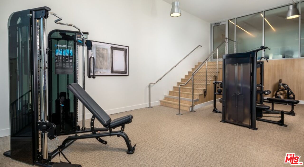 13900 Panay Way, Unit M312 Marina del Rey, CA 90292 - Photo 9 of 21 a view of a room with gym equipment