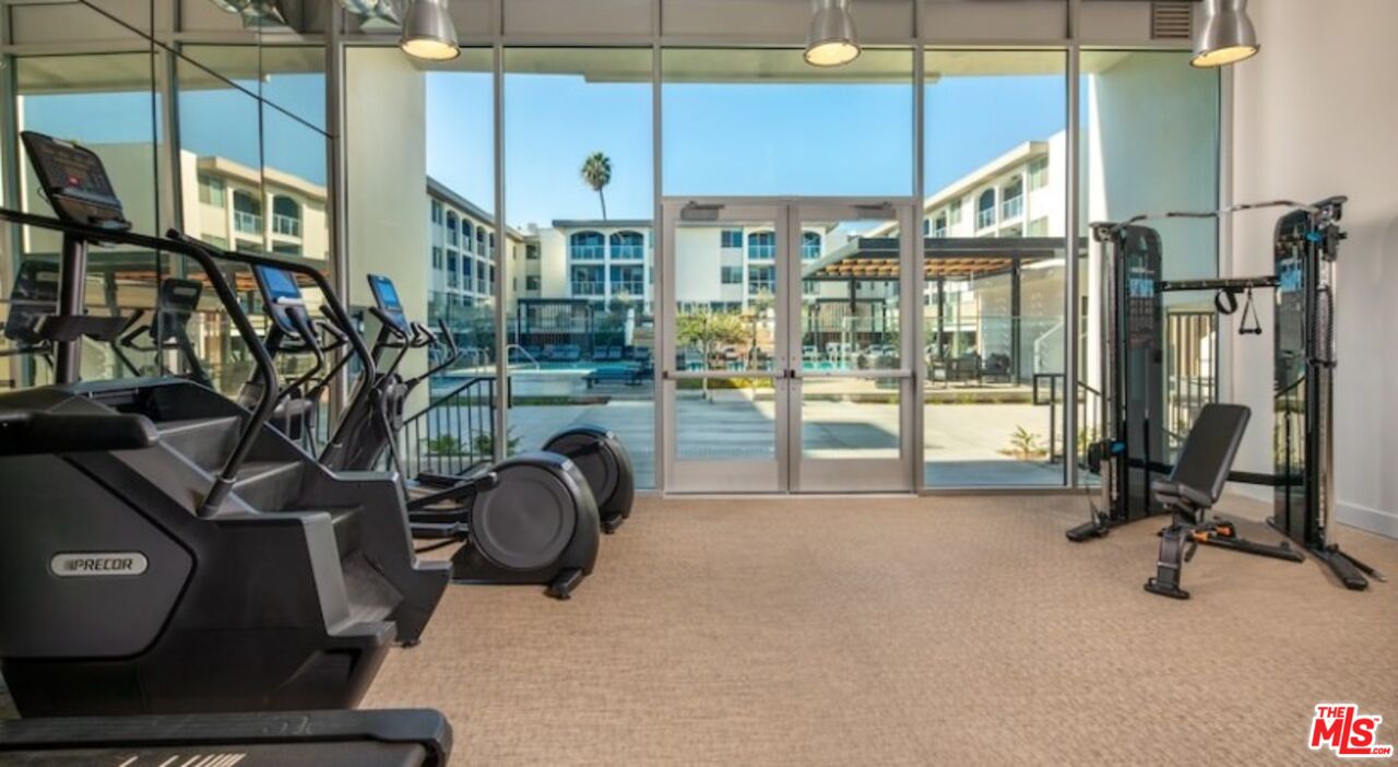 13900 Panay Way, Unit M312 Marina del Rey, CA 90292 - Photo 10 of 21 a view of a room with gym equipment