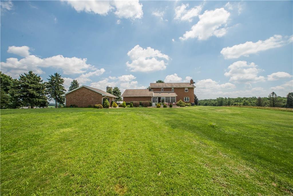 662 Bocktown Cork Road Clinton, PA 15026 - Photo 22 of 25 The current owner maintains a large flat yard, the side property lines are approximately the row of trees on the left side of this photo and the mowed edge on the right side of the photo.