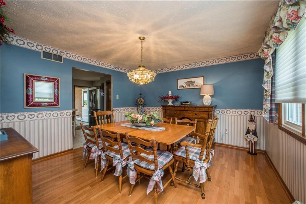662 Bocktown Cork Road Clinton, PA 15026 - Photo 5 of 25 The home's dining room has a wide opening into the updated kitchen as seen center left. The double windows overlook the front of the property.