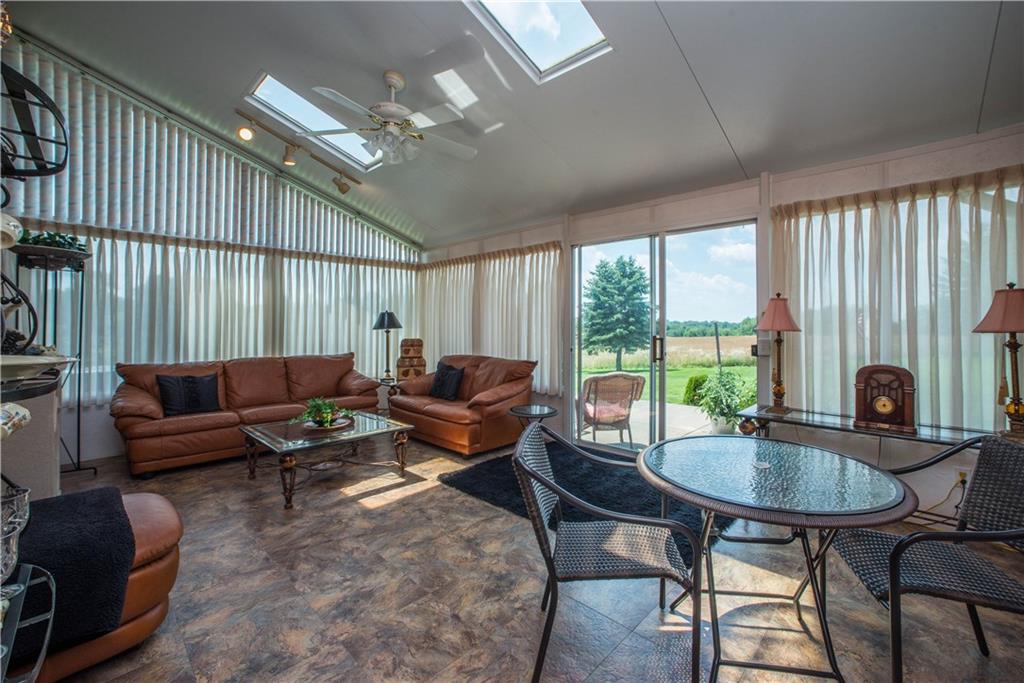 662 Bocktown Cork Road Clinton, PA 15026 - Photo 10 of 25 This fabulous sunroom is located off the kitchen and provides views of the rear lawn. Walls of windows and skylights ensure that this will always be a cheerful room any time of the year.
