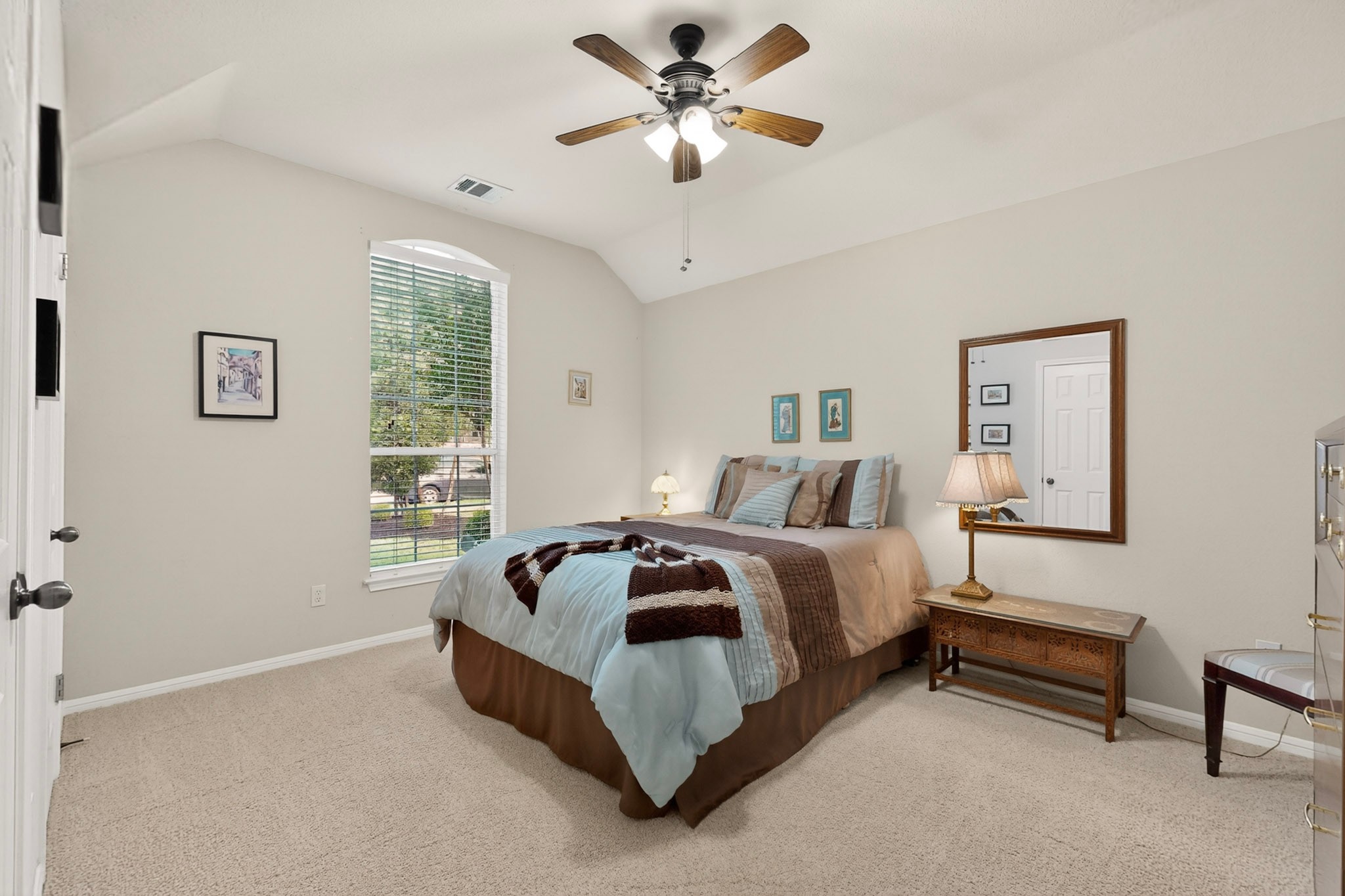 905 Victoria Ridge Drive Pflugerville, TX 78660 - Photo 23 of 32 A restful chamber awaits, featuring soft carpeting and a ceiling fan for comfort.