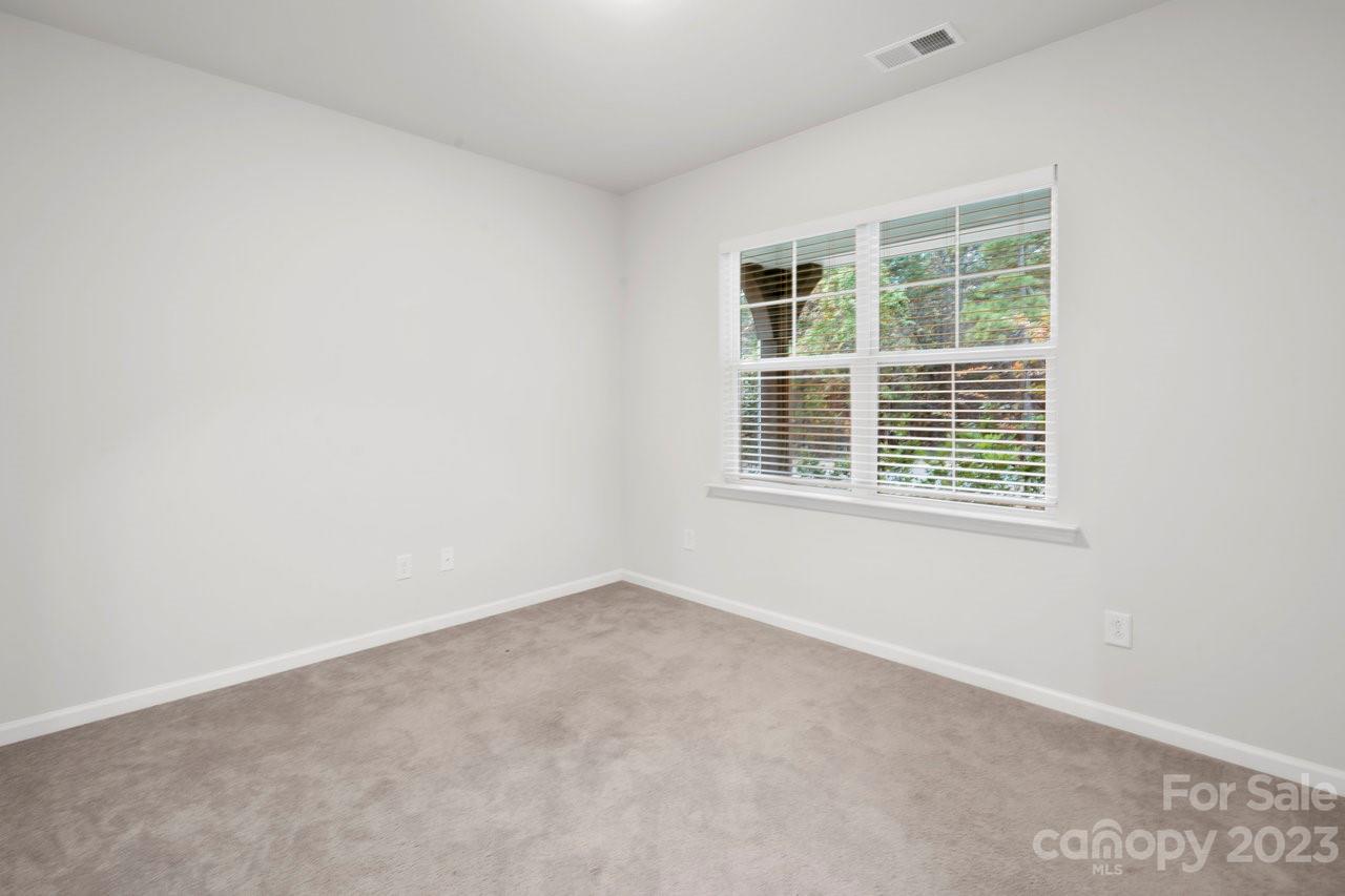 18209 Kalabash Road Charlotte, NC 28278 - Photo 15 of 48 an empty room with a window