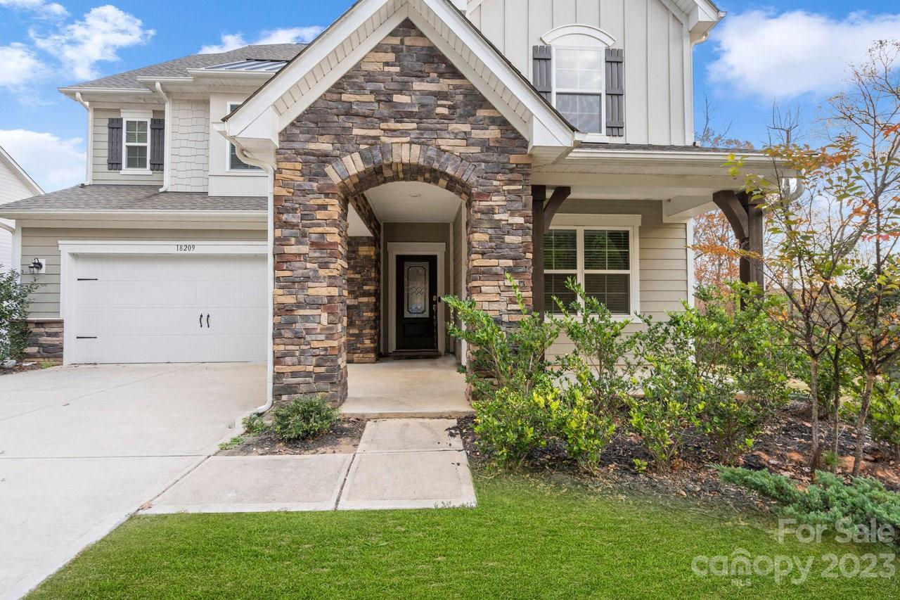 18209 Kalabash Road Charlotte, NC 28278 - Photo 2 of 48 front view of a house with a yard