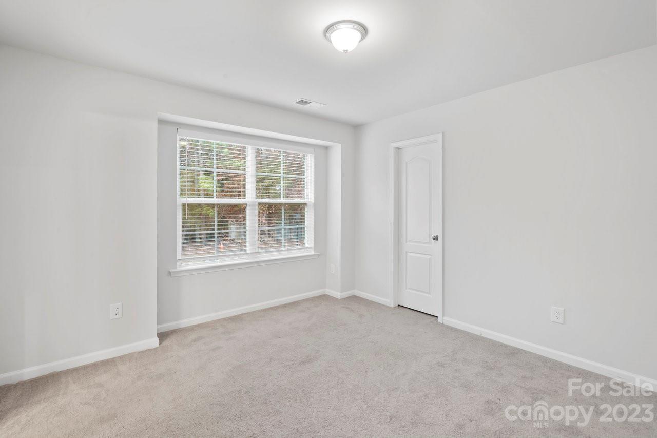 18209 Kalabash Road Charlotte, NC 28278 - Photo 21 of 48 an empty room with a window