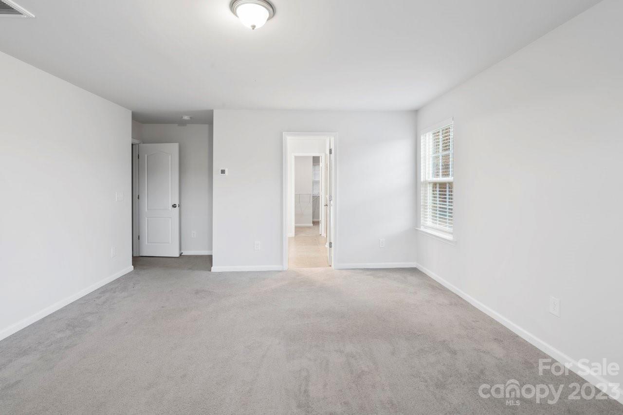 18209 Kalabash Road Charlotte, NC 28278 - Photo 26 of 48 a view of an empty room with a window