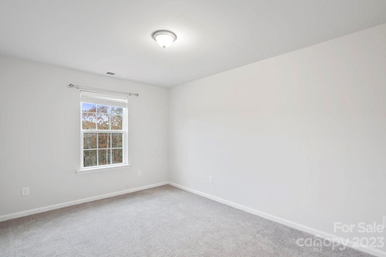 18209 Kalabash Road Charlotte, NC 28278 - Photo 27 of 48 an empty room with a window