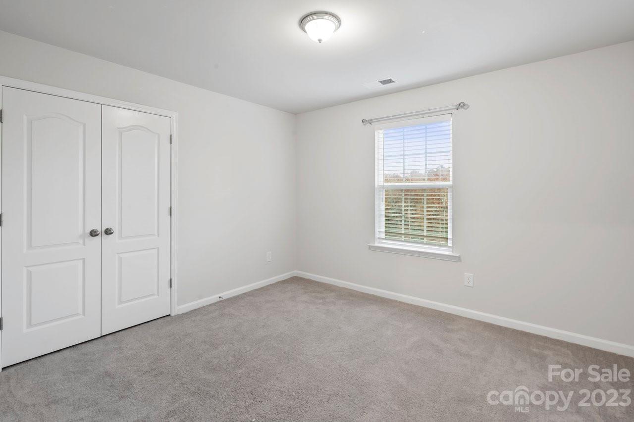 18209 Kalabash Road Charlotte, NC 28278 - Photo 28 of 48 a view of an empty room with a window