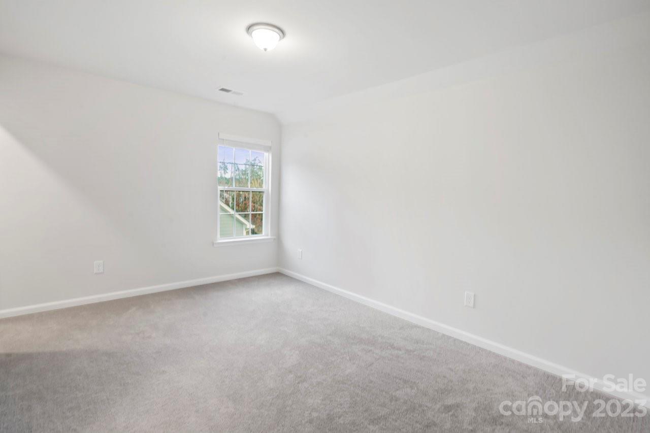 18209 Kalabash Road Charlotte, NC 28278 - Photo 30 of 48 an empty room with windows