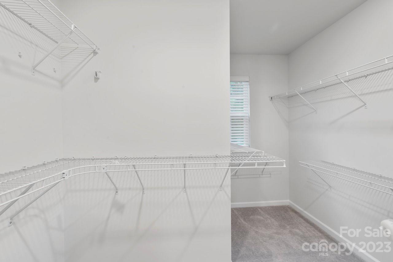18209 Kalabash Road Charlotte, NC 28278 - Photo 32 of 48 a view of an empty walk in closet
