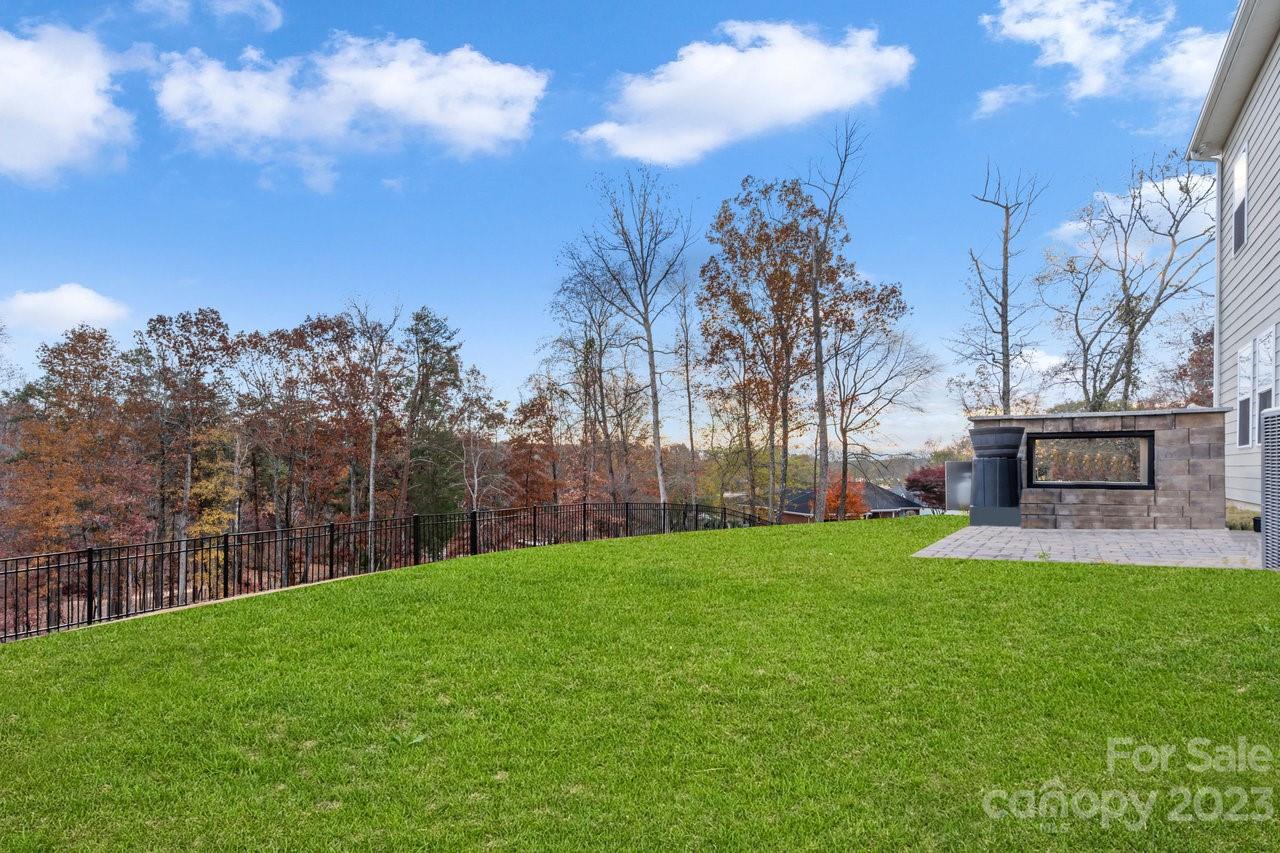 18209 Kalabash Road Charlotte, NC 28278 - Photo 37 of 48 a view of a backyard with a big yard