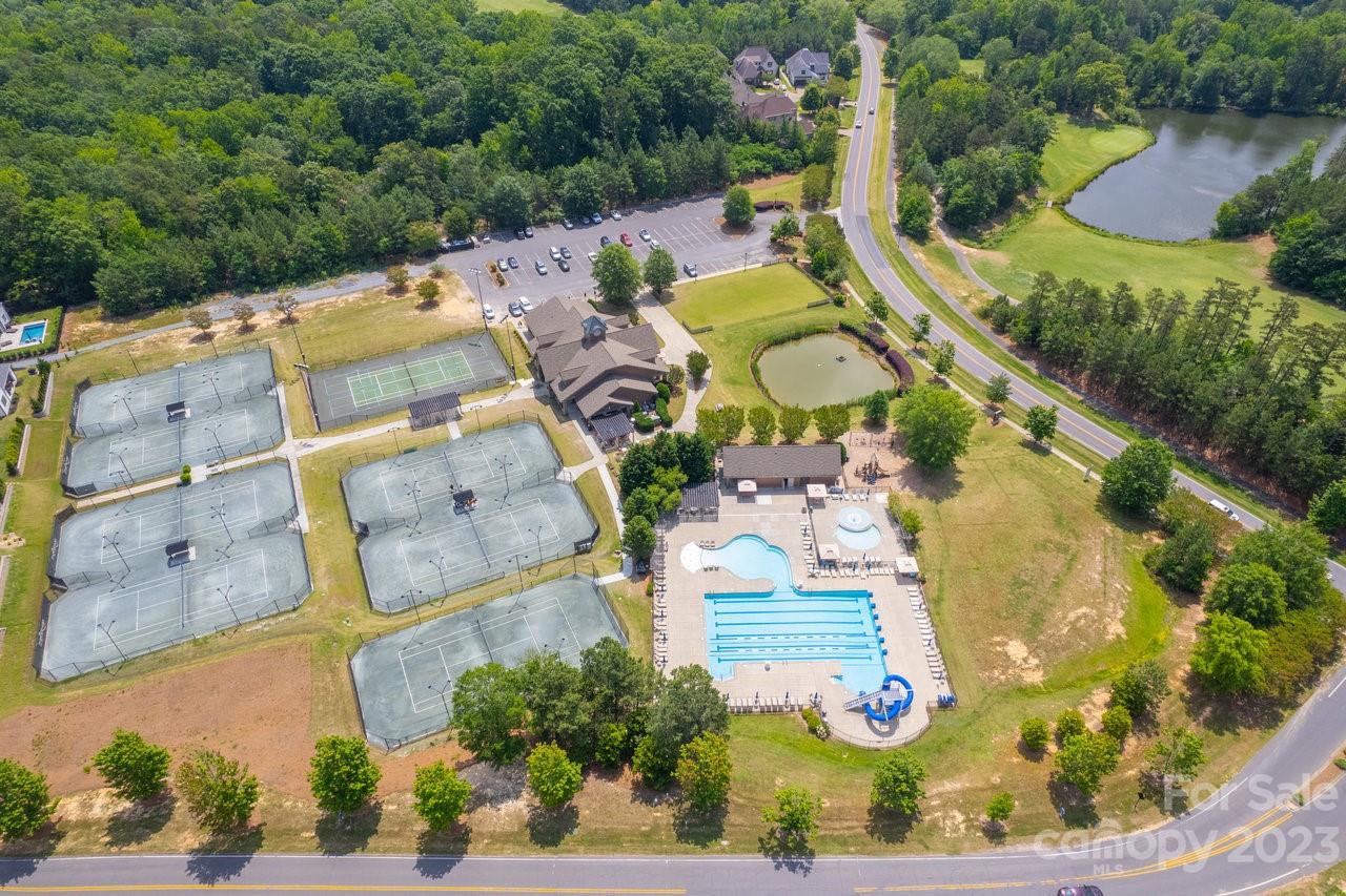 18209 Kalabash Road Charlotte, NC 28278 - Photo 42 of 48 an aerial view of residential houses with outdoor space and swimming pool