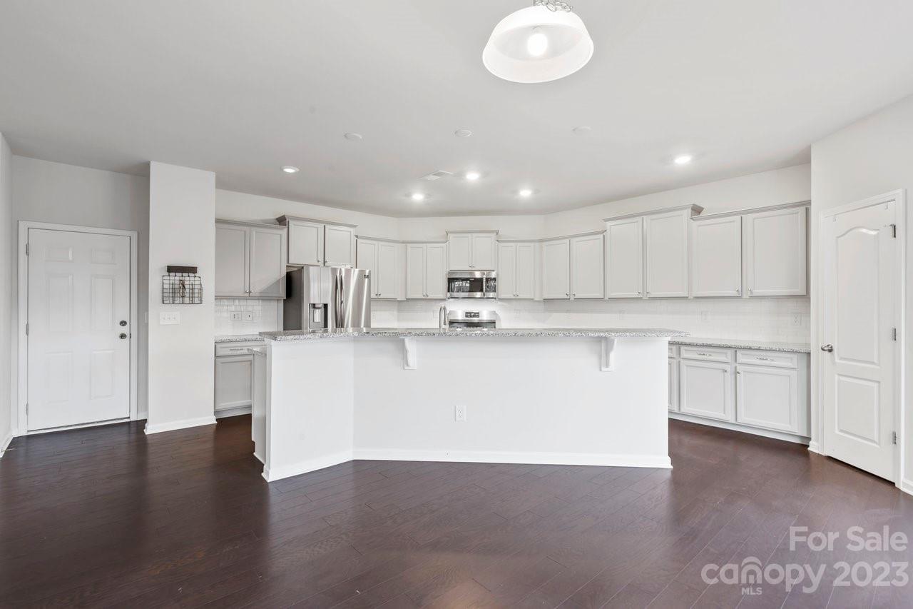 18209 Kalabash Road Charlotte, NC 28278 - Photo 6 of 48 a view of kitchen with stainless steel appliances refrigerator sink and cabinets