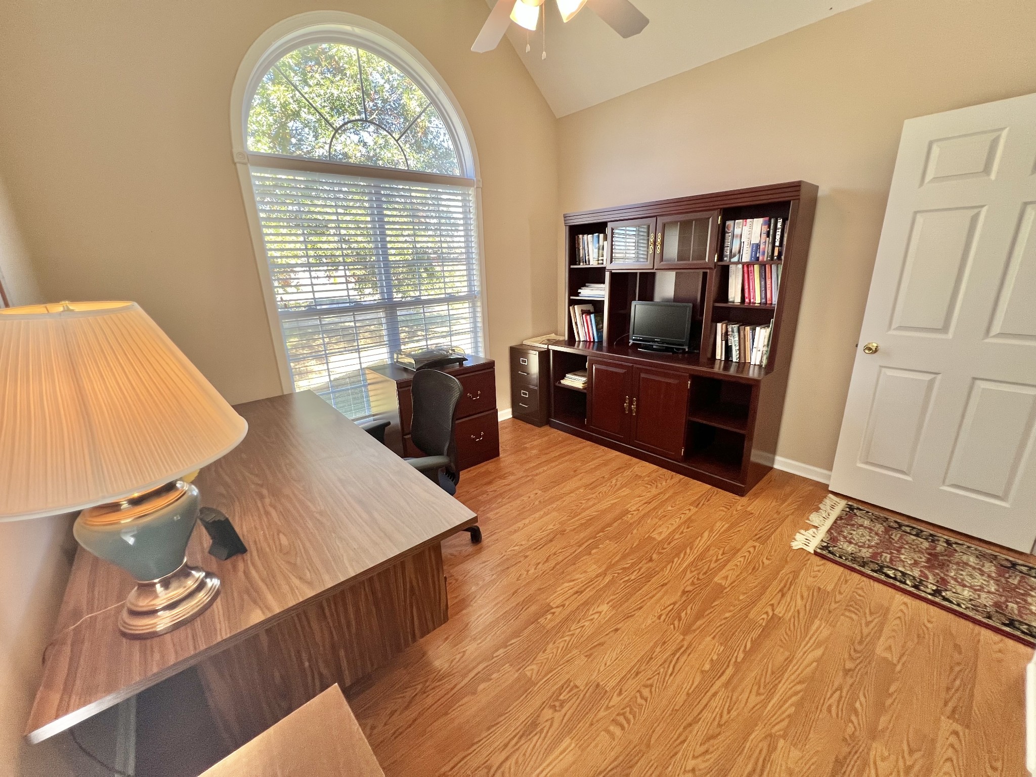 291 Bailey Lane Pleasant View, TN 37146 - Photo 30 of 37 a bedroom with a bed and wooden floor