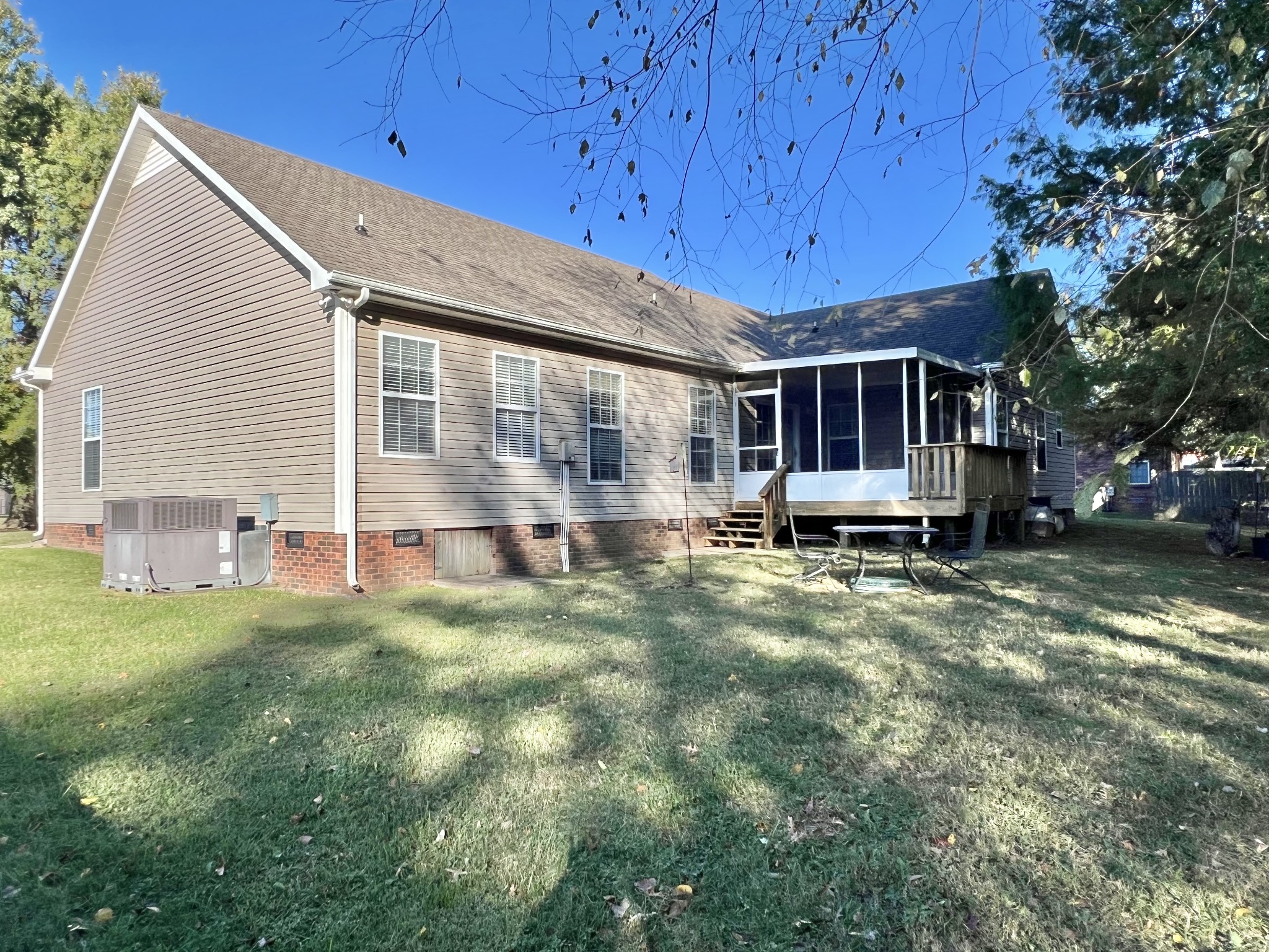 291 Bailey Lane Pleasant View, TN 37146 - Photo 33 of 37 a view of a house with backyard and sitting area
