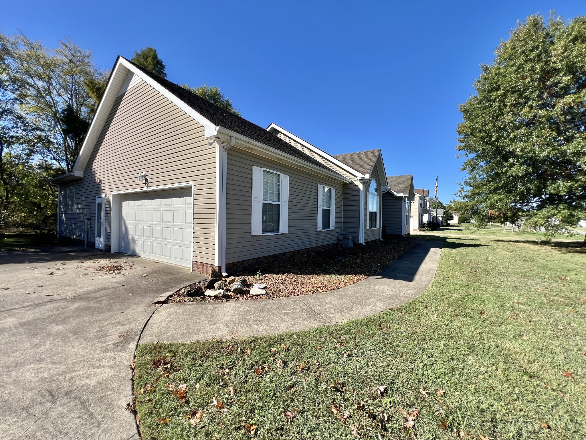 291 Bailey Lane Pleasant View, TN 37146 - Photo 36 of 37 a backyard of a house with yard and garage